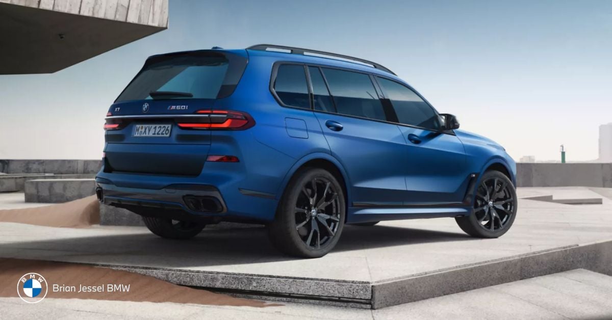 Blue BMW X7 SUV standing on a stage