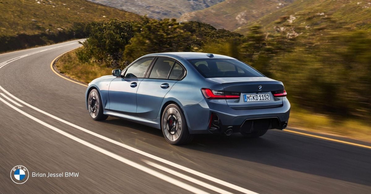 BMW 3 Series compact luxury sedan driving on winding road emphasizing sporty family practicality