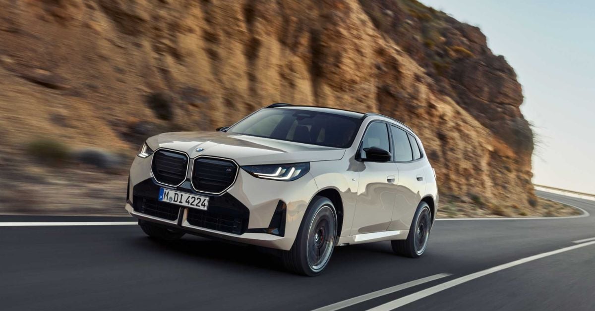 Beige BMW X3 drives along mountain road, offering balanced luxury, space, and everyday versatility for families.