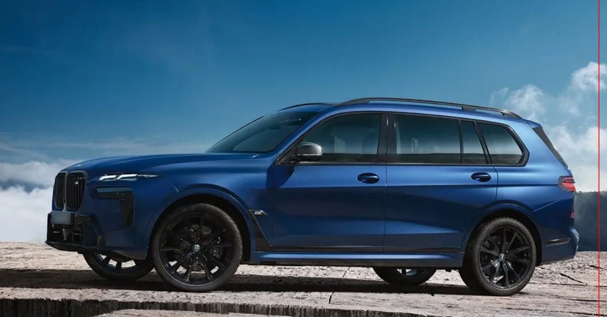 Blue BMW X7 M60i full-size SUV parked outdoors, highlighting luxury design, spacious proportions, and performance presence