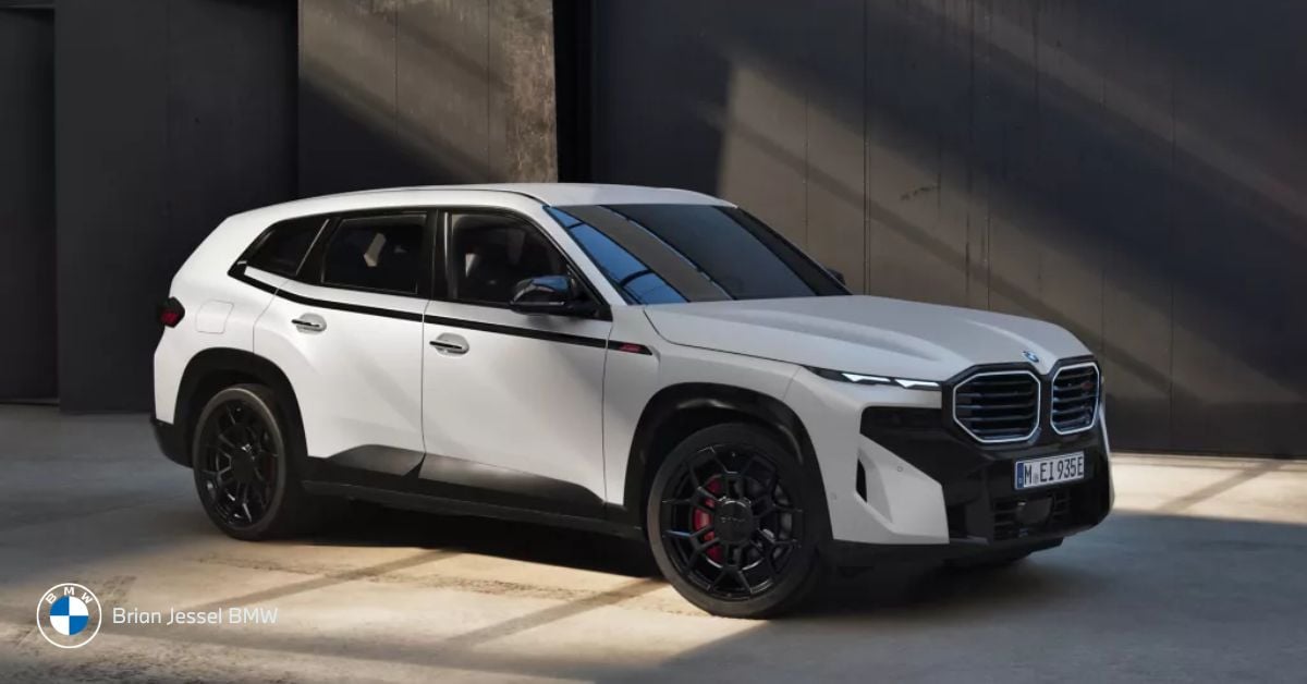 BMW XM performance hybrid SUV parked outdoors, showcasing bold styling, powerful stance, and luxury design details.