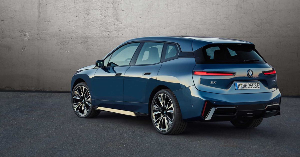 Blue BMW iX M70 parked on pavement, representing fast electric SUV choice for Vancouver’s urban and outdoor driving needs