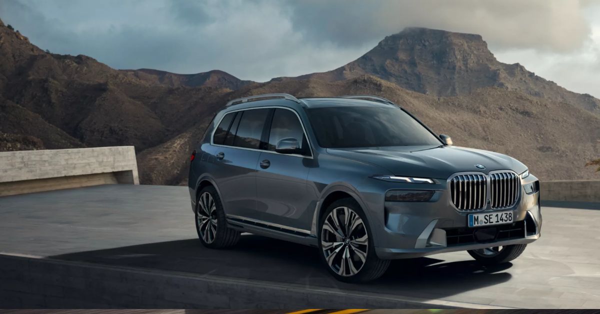 BMW SUV parked overlooking mountains, illustrating versatile performance, comfort, and capability for Vancouver driving conditions.