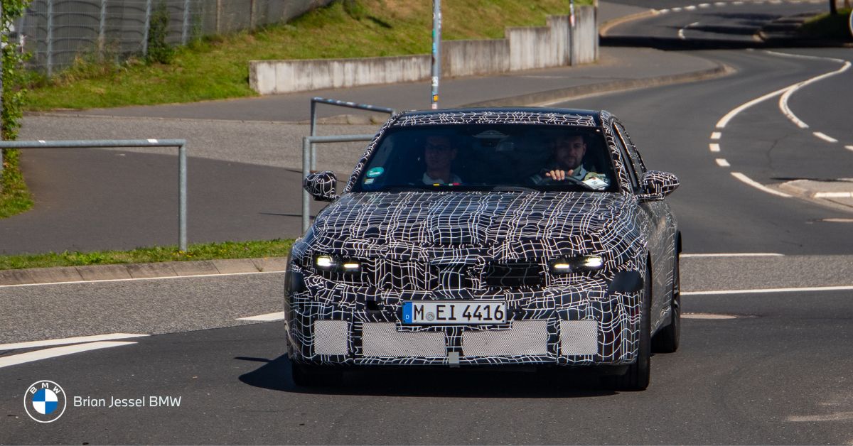 BMW 3 Series G50 prototype testing in winter conditions with camouflage wrap