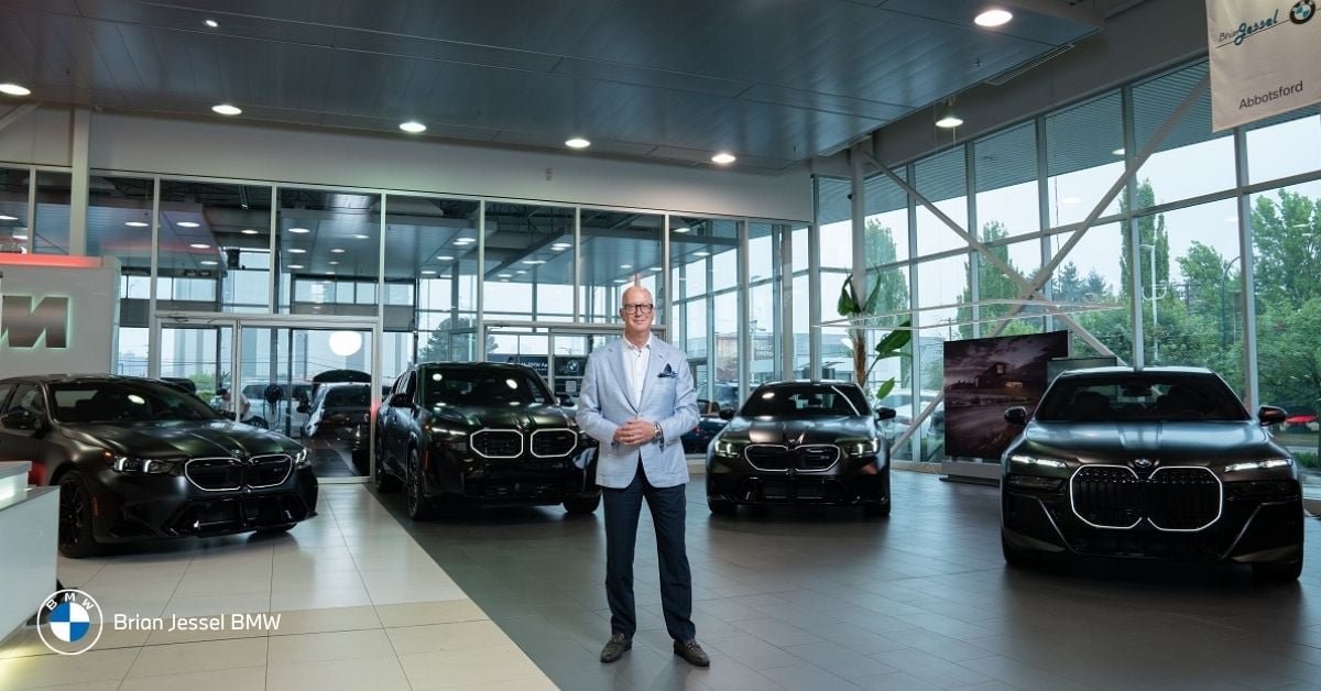 Brian Jessel BMW showroom in Vancouver with staff and vehicles, highlighting M3 M4 inventory, service, financing options available