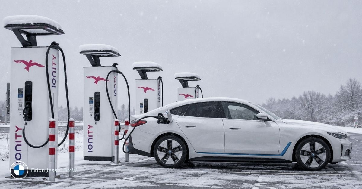 BMW i4 charging during snowy Canadian winter, highlighting cold-weather EV charging performance and public charging accessibility nationwide.