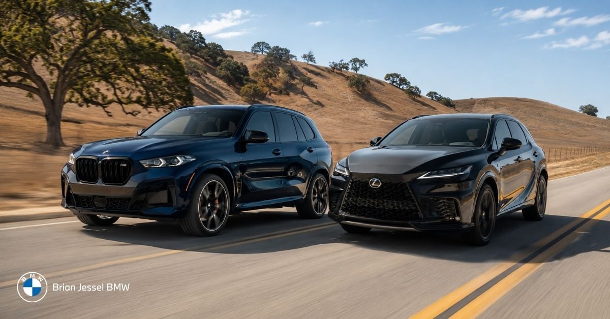 Blue 2026 BMW X5 and black Lexus RX driving side by side on scenic hilly road