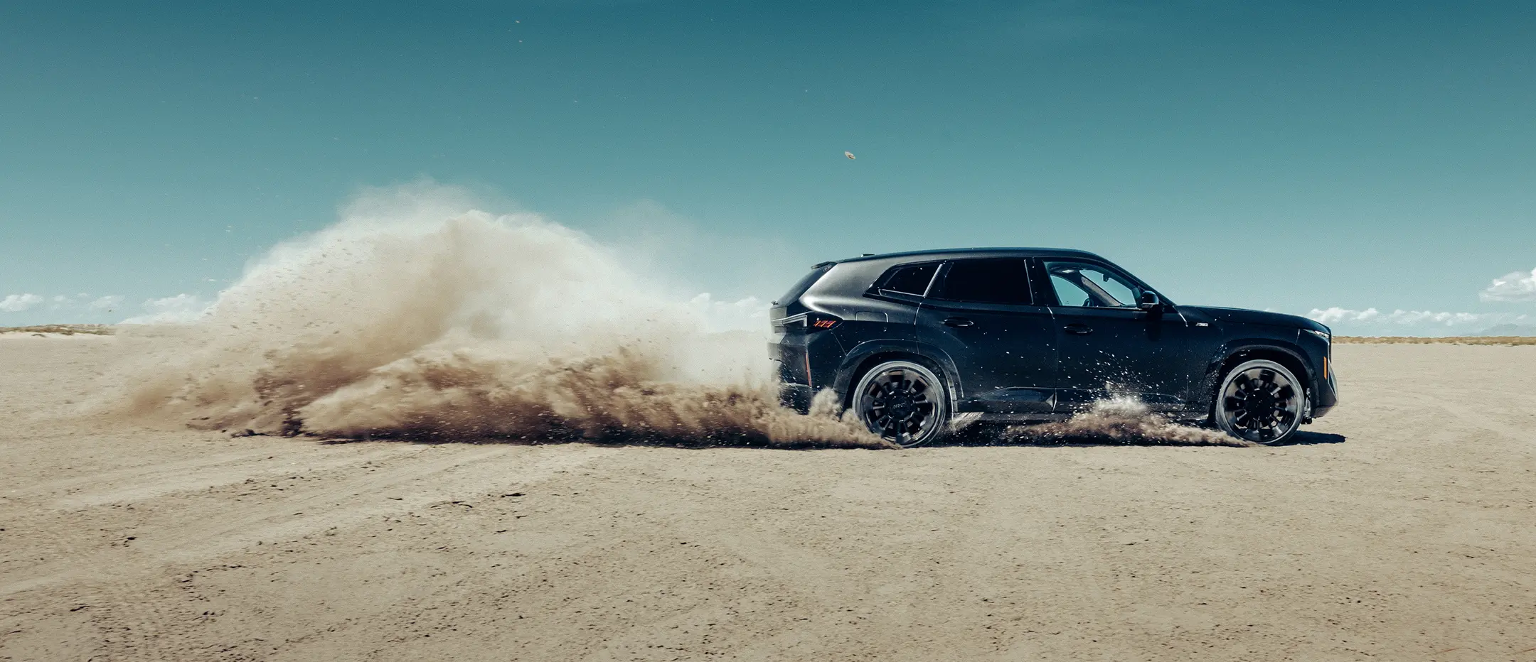 BMW SUV on desert terrain