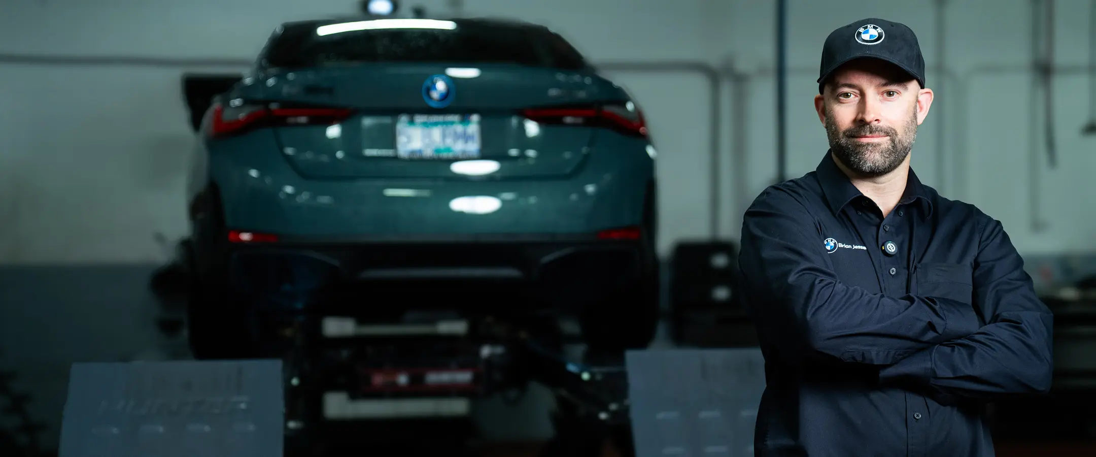 BMW certified collision repair technician at work
