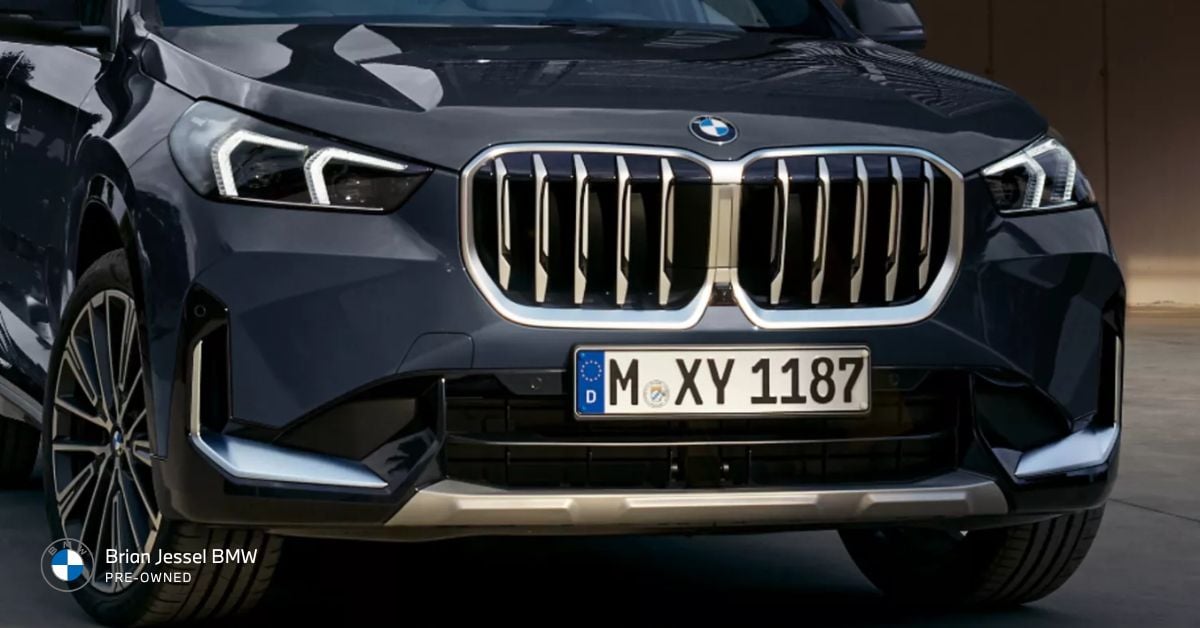 Detailed shot of the BMW X1, highlighting its front grille and the stylish wheels