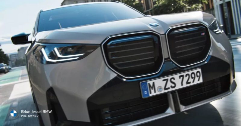 A front view of a BMW Model X, highlighting its luxury and performance features for used SUV buyers