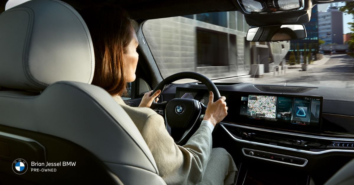 Close-up of a BMW interior showing the advanced dashboard and xDrive performance