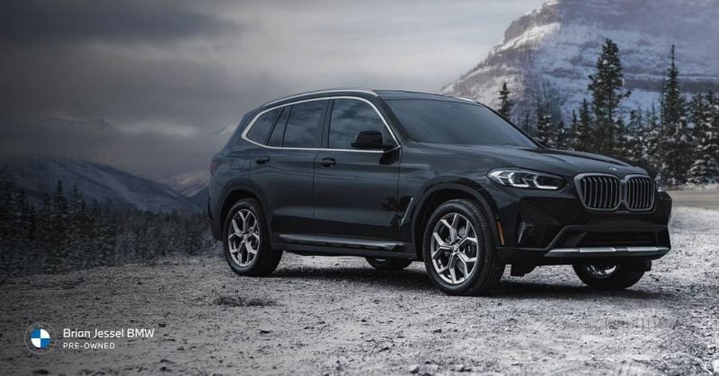 BMW X3 compact SUV parked in mountain setting, emphasizing durability, versatility, and long-lasting performance for everyday driving.