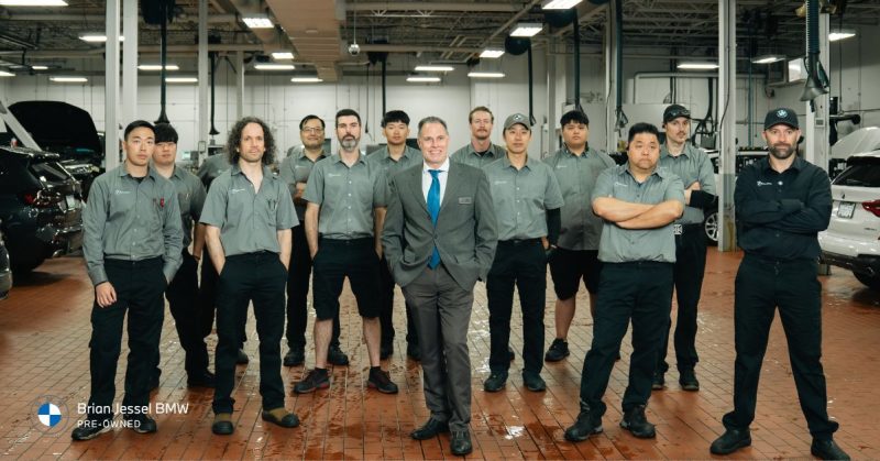 Team of technicians and staff at Brian Jessel BMW Pre-Owned, ready to assist customers with expert guidance
