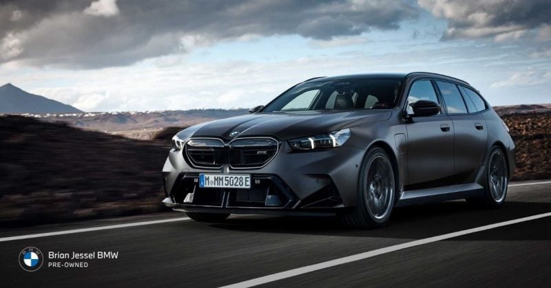 2025 BMW M5 Touring performance wagon driving on open road, showcasing hybrid power, cargo space, and dynamic capability