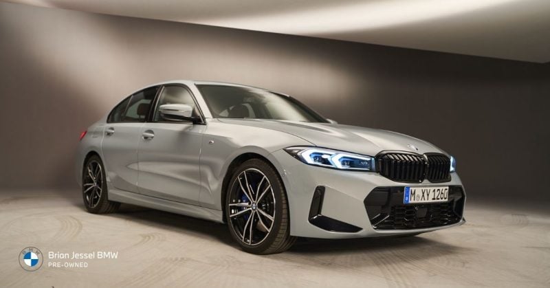 Silver BMW 3 Series sedan in studio setting highlighting balanced luxury, modern styling, and approachable driving for beginners.