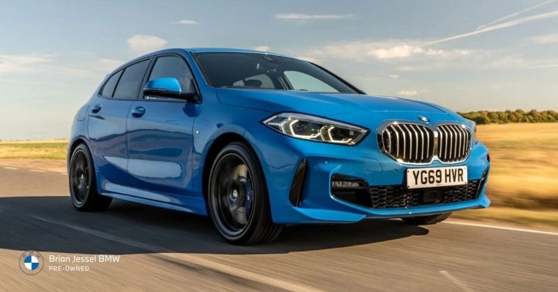 Blue BMW X1 compact SUV driving on open road, highlighting beginner-friendly luxury, visibility, and practical everyday city usability.