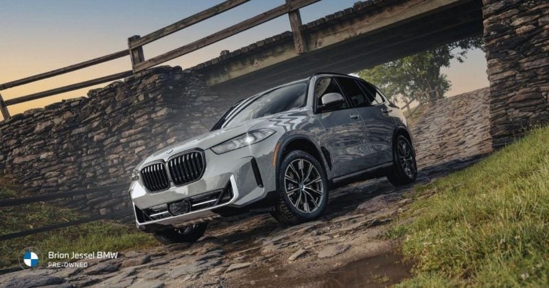 BMW X5 SUV driving on rocky terrain, showing balanced off-road capability, stability, comfort, and everyday driving practicality