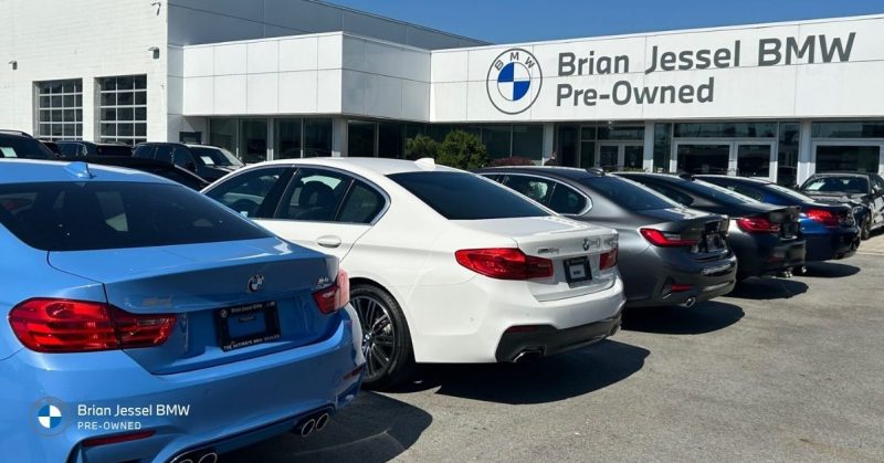 Brian Jessel BMW team outside Vancouver dealership, highlighting trusted luxury vehicle sales, financing, inspections, and customer support services.