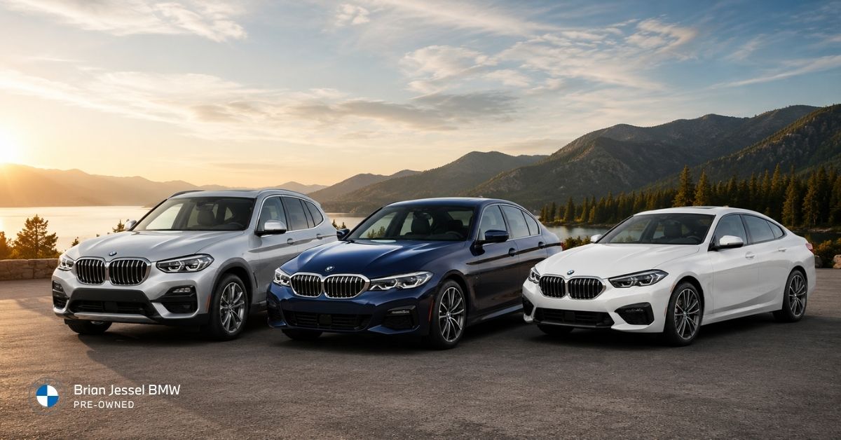 BMW vehicles parked at a scenic mountain lake overlook during golden hour showcase distinct ownership options.