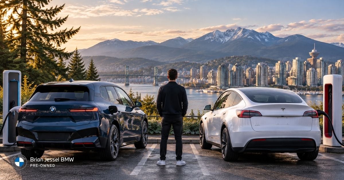 BMW and Tesla electric vehicles charging at a Vancouver overlook as a buyer compares used EVs.