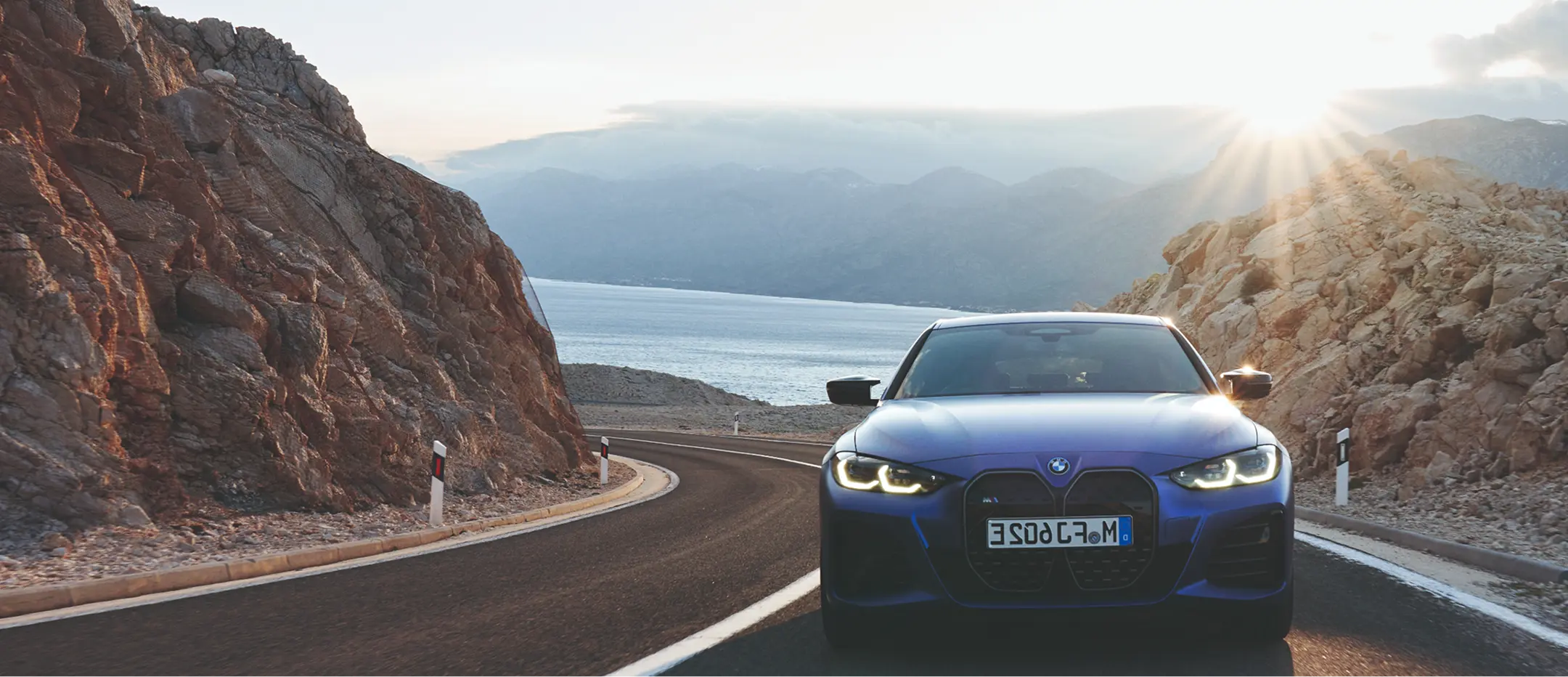 2024 BMW i4 on a coastal road