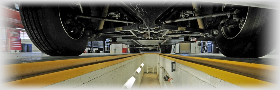  Bottom view of the RV inside the service shop