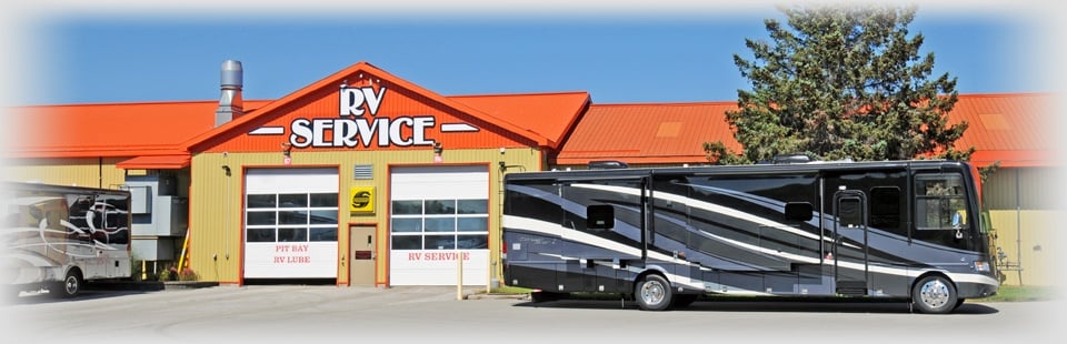  RV parked outside of the RV service shop