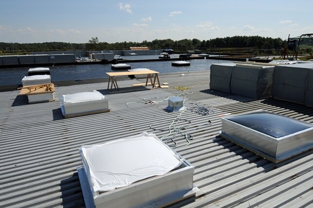  Roof skylights being installed
