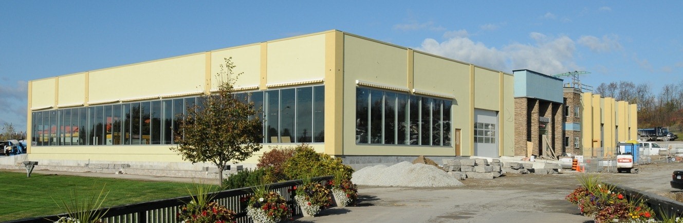 New building covered in yellow paint